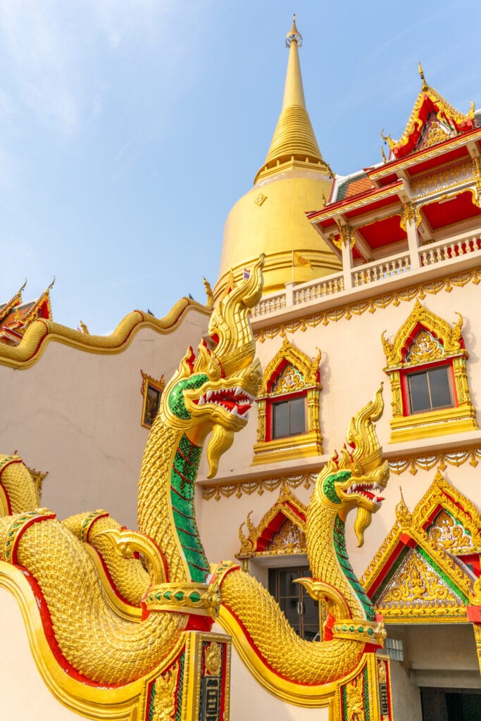 Vipassana meditation building for Buddhists, with a yellow bell-shaped pagoda at Wat Pai Luang